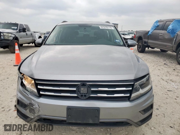 2021 Volkswagen Tiguan S with VIN 3VV1B7AX0MM033300, listed as a Copart auction lot 57270715 with 70,125 mi miles and Salvage title. Bid and sale history available at DreamBid. Image 5.
