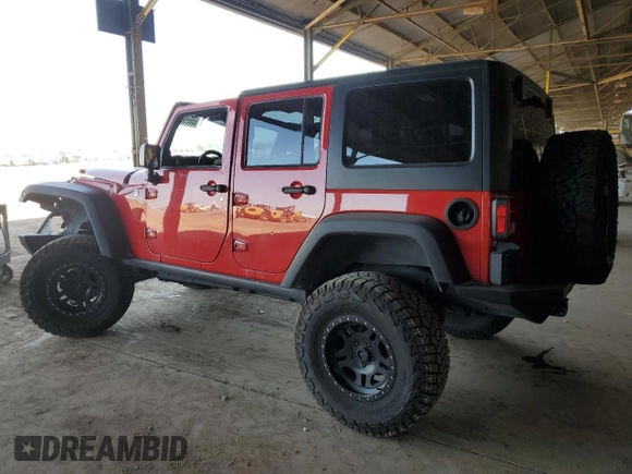 2012 Jeep Wrangler Unlimited Call of Duty MW3 with VIN 1C4BJWFGXCL225459, listed as a Copart auction lot 60699895 with 98,196 mi miles and Salvage title. Bid and sale history available at DreamBid. Image 2.