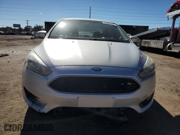 2016 Ford Focus SE with VIN 1FADP3F29GL314719, listed as a Copart auction lot 77686334 with 76,515 mi miles and Salvage title. Bid and sale history available at DreamBid. Image 5.