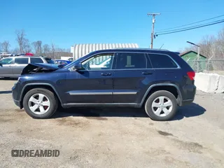 2011 Jeep Grand Cherokee Laredo with VIN 1J4RR4GG3BC670712, listed as a IAAI auction lot 41738127 with 93,714 mi miles and . Bid and sale history available at DreamBid. Image 14.