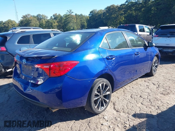 2017 Toyota Corolla L with VIN 2T1BURHE0HC937580, listed as a IAAI auction lot 40591004 with 112,411 mi miles and . Bid and sale history available at DreamBid. Image 4.