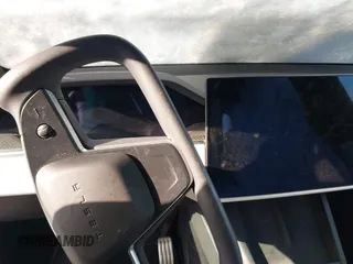 2022 Tesla Model X Plaid z VIN 7SAXCBE69NF343318, wystawiony jako IAAI lot #41387403 z przebiegiem Nie podano mil oraz . Historia ofert i sprzedaży dostępna na DreamBid. Obrazek 18.