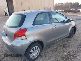 2009 Toyota Yaris with VIN JTDJT903495243871, listed as a IAAI auction lot 41753770 with 189,944 mi miles and . Bid and sale history available at DreamBid. Image 4.