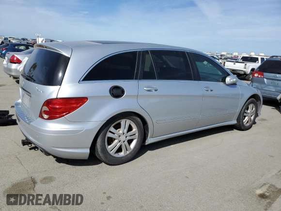 2009 Mercedes-Benz R 3.5L with VIN 4JGCB65E79A091057, listed as a Copart auction lot 52186915 with 99,173 mi miles and Salvage Title. Bid and sale history available at DreamBid. Image 3.