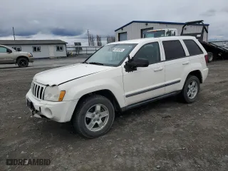 2007 Jeep Grand Cherokee Laredo with VIN 1J8GR48K17C638499, listed as a Copart auction lot 49649565 with 195,000 mi miles and Salvage Title. Bid and sale history available at carsss.com. Image 1.