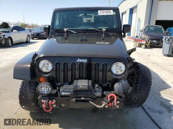 2009 Jeep Wrangler X with VIN 1J4FA24139L730383, listed as a Copart auction lot 51914935 with 168,265 mi miles and Salvage Title. Bid and sale history available at DreamBid. Image 5.