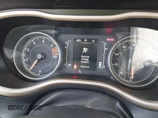 2016 Jeep Cherokee Altitude z VIN 1C4PJLCB5GW208005, wystawiony jako IAAI lot #42120987 z przebiegiem 179 423 mil mil oraz . Historia ofert i sprzedaży dostępna na DreamBid. Obrazek 7.