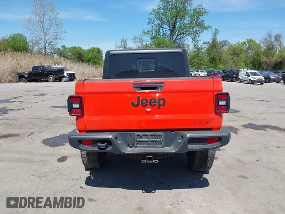 2020 Jeep Gladiator Sport S z VIN 1C6HJTAG0LL149161, wystawiony jako IAAI lot #42071132 z przebiegiem 153 062 mil mil oraz . Historia ofert i sprzedaży dostępna na DreamBid. Obrazek 16.