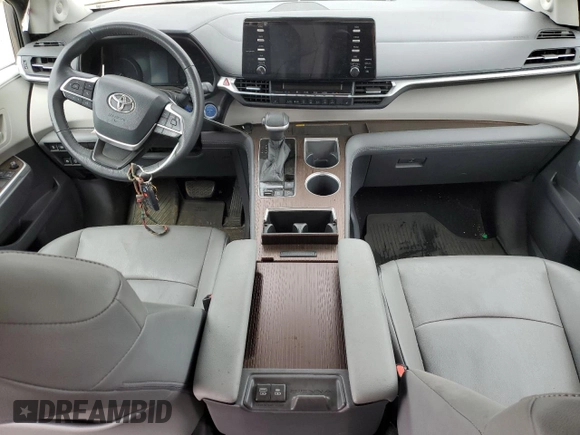 2021 Toyota Sienna XLE z VIN 5TDJSKFC0MS033577, wystawiony jako Copart lot #57146505 z przebiegiem 60 397 mil mil oraz Szkoda całkowita • Salvage title. Historia ofert i sprzedaży dostępna na DreamBid. Obrazek 8.