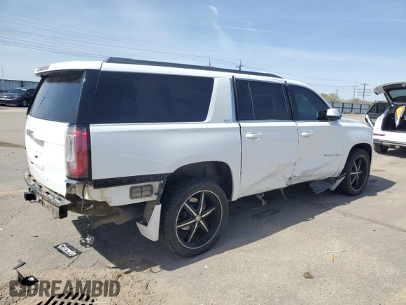 2016 GMC Yukon XL SLT with VIN 1GKS2GKC6GR228033, listed as a Copart auction lot 52450055 with 135,476 mi miles and Salvage Title. Bid and sale history available at DreamBid. Image 3.