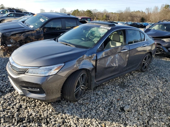 2017 Honda Accord Touring with VIN 1HGCR3F97HA032008, listed as a Copart auction lot 41824625 with 56,965 mi miles and Salvage title. Bid and sale history available at DreamBid. Image 1.