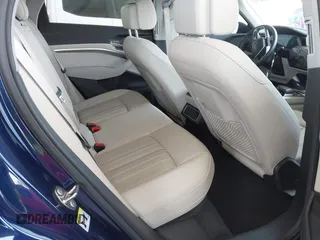 2021 Audi e-tron Premium Plus with VIN WA1LAAGE4MB038563, listed as a IAAI auction lot 42422063 with 31,645 mi miles and . Bid and sale history available at DreamBid. Image 8.