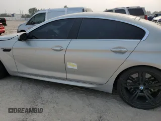 2017 BMW M6 z VIN WBS6E9C56HG437374, wystawiony jako Copart lot #54277624 z przebiegiem 80 858 mil mil oraz . Historia ofert i sprzedaży dostępna na DreamBid. Obrazek 12.