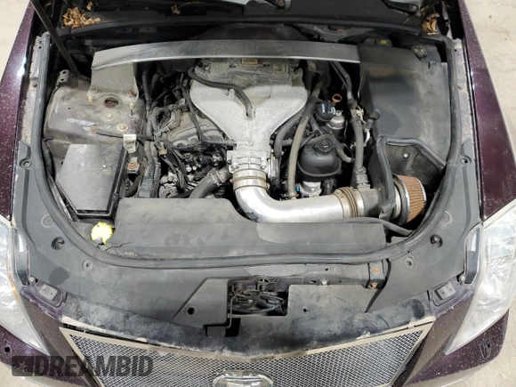 2009 Cadillac CTS AWD z VIN 1G6DT57V990136974, wystawiony jako Copart lot #50154525 z przebiegiem 196 934 mil mil oraz Szkoda całkowita • Salvage title. Historia ofert i sprzedaży dostępna na DreamBid. Obrazek 12.