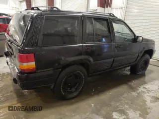 1997 Jeep Grand Cherokee Laredo с VIN 1J4GZ58S3VC508180, выставлен на аукционе Copart как лот 54856525 с пробегом 214 845 миль миль и На запчасти • Non repairable. История ставок и продаж доступна на DreamBid. Изображение 3.