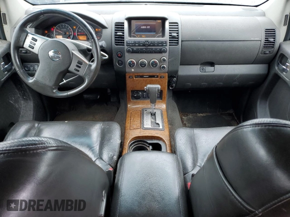 2006 Nissan Pathfinder SE z VIN 5N1AR18W66C610092, wystawiony jako Copart lot #60208105 z przebiegiem 235 876 mil mil oraz Czysty tytuł • Clean title. Historia ofert i sprzedaży dostępna na DreamBid. Obrazek 8.