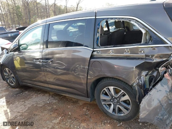 2015 Honda Odyssey Touring Elite with VIN 5FNRL5H90FB097984, listed as a IAAI auction lot 41822726 with 107,322 mi miles. Bid and sale history available at carsss.com. Image 14.