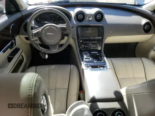 2014 Jaguar XJ Portfolio with VIN SAJWA2GZ2E8V70065, listed as a Copart auction lot 43872505 with 138,677 mi miles and Salvage title. Bid and sale history available at DreamBid. Image 8.