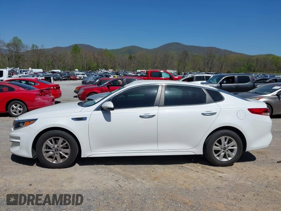2016 Kia Optima LX z VIN 5XXGT4L3XGG080662, wystawiony jako IAAI lot #42048361 z przebiegiem 99 564 mil mil oraz . Historia ofert i sprzedaży dostępna na DreamBid. Obrazek 14.