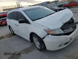 2012 Honda Odyssey Touring with VIN 5FNRL5H91CB047042, listed as a Copart auction lot 82248004 with 123,445 mi miles and Salvage Title. Bid and sale history available at carsss.com. Image 4.