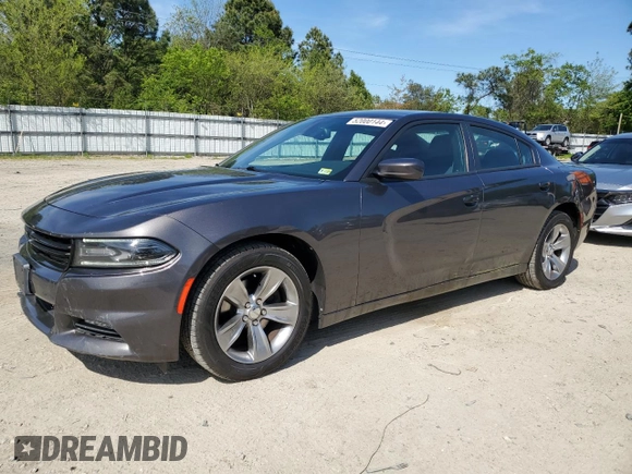 2015 Dodge Charger SXT with VIN 2C3CDXHG8FH794623, listed as a Copart auction lot 52000144 with 145,624 mi miles and Salvage Title. Bid and sale history available at DreamBid. Image 1.
