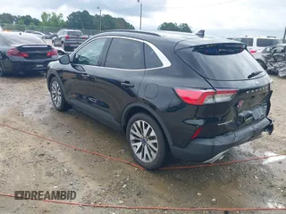 2021 Ford Escape Titanium Hybrid z VIN 1FMCU0DZ0MUA16798, wystawiony jako IAAI lot #42502086 z przebiegiem 107 250 mil mil oraz . Historia ofert i sprzedaży dostępna na DreamBid. Obrazek 3.