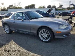 2002 Mazda MX-5 Miata Cloth with VIN JM1NB353X20228420, listed as a Copart auction lot 47949235 with 94,341 mi miles and Salvage title. Bid and sale history available at DreamBid. Image 4.