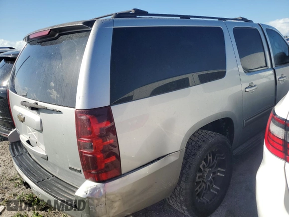 2010 Chevrolet Suburban LT with VIN 1GNUCJE08AR133956, listed as a Copart auction lot 76145714 with 212,459 mi miles and Salvage Title. Bid and sale history available at carsss.com. Image 3.