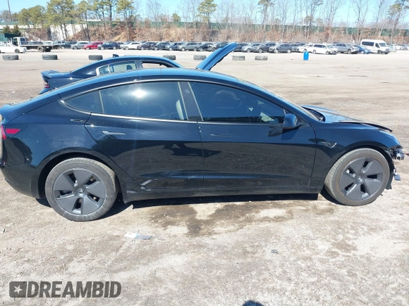 2023 Tesla Model 3 Long Range with VIN 5YJ3E1EB1PF632595, listed as a IAAI auction lot 41754131 with 8,147 mi miles and . Bid and sale history available at DreamBid. Image 13.