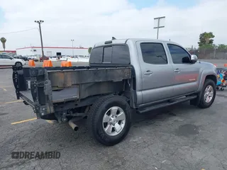 2014 Toyota Tacoma PreRunner z VIN 3TMJU4GNXEM164121, wystawiony jako IAAI lot #42568581 z przebiegiem 201 316 mil mil oraz . Historia ofert i sprzedaży dostępna na DreamBid. Obrazek 4.