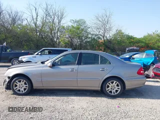 2003 Mercedes-Benz E-Class 3.2L with VIN WDBUF65J93X099223, listed as a IAAI auction lot 42033473 with 230,758 mi miles. Bid and sale history available at carsss.com. Image 14.