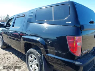 2011 Honda Ridgeline RTS with VIN 5FPYK1F48BB005889, listed as a IAAI auction lot 41761367 with 146,974 mi miles. Bid and sale history available at carsss.com. Image 14.