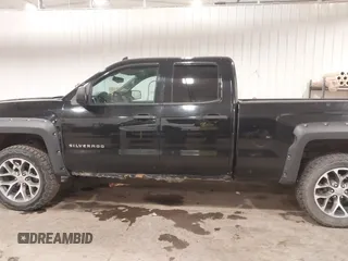 2014 Chevrolet Silverado 1500 LT with VIN 1GCVKREH2EZ225509, listed as a IAAI auction lot 41728865 with 257,709 mi miles and . Bid and sale history available at DreamBid. Image 14.