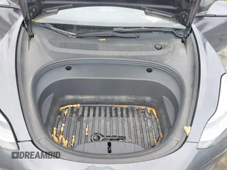 2022 Tesla Model 3 Long Range with VIN 5YJ3E1EB9NF206943, listed as a IAAI auction lot 41911040 with 69,920 mi miles and . Bid and sale history available at DreamBid. Image 10.