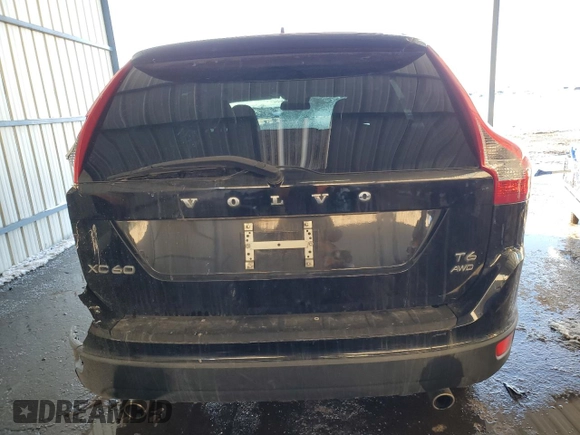 2013 Volvo XC60 T6 z VIN YV4902DZ5D2445725, wystawiony jako Copart lot #41886585 z przebiegiem 96 094 mil mil oraz Szkoda całkowita • Salvage title. Historia ofert i sprzedaży dostępna na DreamBid. Obrazek 6.