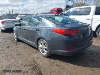 2011 Kia Optima EX with VIN KNAGN4A75B5156895, listed as a IAAI auction lot 41729991 with 151,348 mi miles. Bid and sale history available at carsss.com. Image 3.