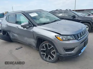 2018 Jeep Compass Limited with VIN 3C4NJCCBXJT499864, listed as a IAAI auction lot 42319832 with 94,893 mi miles and . Bid and sale history available at DreamBid. Image 1.