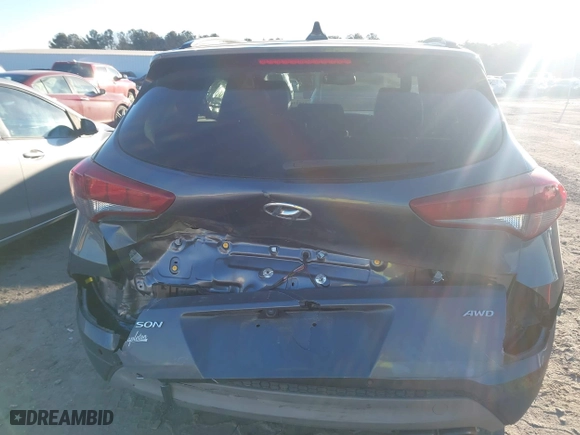 2018 Hyundai Tucson Value with VIN KM8J3CA2XJU776526, listed as a IAAI auction lot 41322657 with 102,444 mi miles. Bid and sale history available at carsss.com. Image 16.