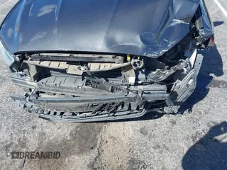 2015 Ford Fusion SE with VIN 3FA6P0H74FR185921, listed as a IAAI auction lot 41745943 with 143,083 mi miles. Bid and sale history available at carsss.com. Image 6.