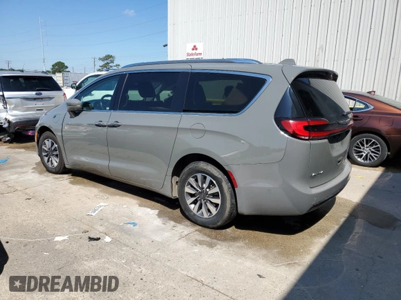 2021 Chrysler Pacifica Hybrid Touring L with VIN 2C4RC1L72MR599413, listed as a Copart auction lot 56419875 with 108,986 mi miles and Salvage title. Bid and sale history available at DreamBid. Image 2.