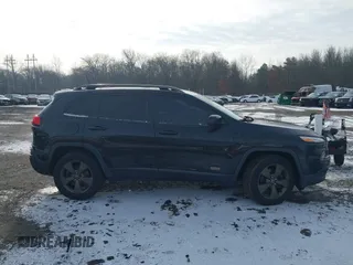 2016 Jeep Cherokee Latitude with VIN 1C4PJMCS1GW326557, listed as a IAAI auction lot 41474801 with 207,805 mi miles. Bid and sale history available at carsss.com. Image 13.