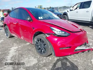2022 Tesla Model Y Long Range z VIN 7SAYGDEE1NF385414, wystawiony jako IAAI lot #41660542 z przebiegiem 54 075 mil mil oraz . Historia ofert i sprzedaży dostępna na DreamBid. Obrazek 1.