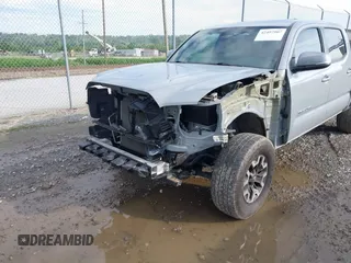 2021 Toyota Tacoma SR with VIN 5TFCZ5AN7MX255512, listed as a IAAI auction lot 42497907 with 50,563 mi miles and . Bid and sale history available at DreamBid. Image 6.