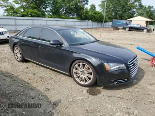 2014 Audi A8 3.0L TDI with VIN WAURMAFD8EN000797, listed as a Copart auction lot 61024275 with 188,223 mi miles and Clean title. Bid and sale history available at DreamBid. Image 4.
