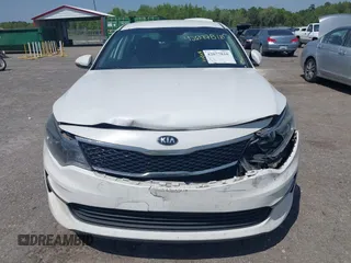 2017 Kia Optima LX with VIN 5XXGT4L39HG129092, listed as a IAAI auction lot 42077810 with 72,912 mi miles and . Bid and sale history available at carsss.com. Image 12.