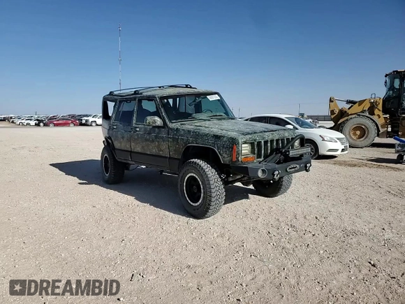 1999 Jeep Cherokee Sport with VIN 1J4FF68S6XL645028, listed as a Copart auction lot 48897255 with 218,552 mi miles and Salvage Title. Bid and sale history available at carsss.com. Image 10.
