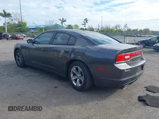 2013 Dodge Charger RT with VIN 2C3CDXCT1DH617932, listed as a IAAI auction lot 41359405 with 126,612 mi miles. Bid and sale history available at carsss.com. Image 3.