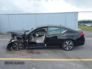 2021 Nissan Altima SV with VIN 1N4BL4DVXMN406122, listed as a IAAI auction lot 42512160 with 54,945 mi miles and . Bid and sale history available at DreamBid. Image 14.