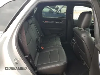 2020 Cadillac XT5 Premium Luxury FWD z VIN 1GYKNCRS1LZ191485, wystawiony jako Copart lot #54657525 z przebiegiem Nie podano mil oraz Szkoda całkowita • Salvage title. Historia ofert i sprzedaży dostępna na DreamBid. Obrazek 11.