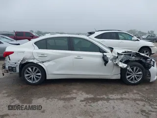 2014 Infiniti Q50 Premium z VIN JN1BV7AP4EM676324, wystawiony jako IAAI lot #42167934 z przebiegiem 114 670 mil mil oraz . Historia ofert i sprzedaży dostępna na DreamBid. Obrazek 14.